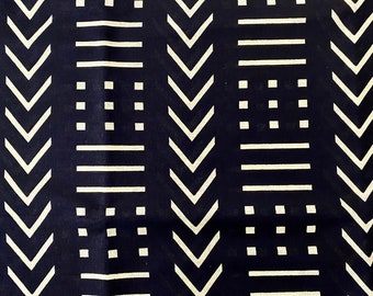 May include: A navy blue fabric with a white geometric pattern. The pattern features chevrons, lines, and squares.