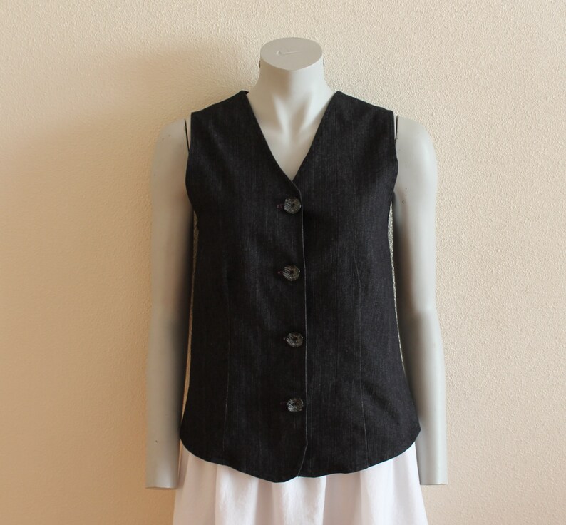 black sleeveless jean jacket