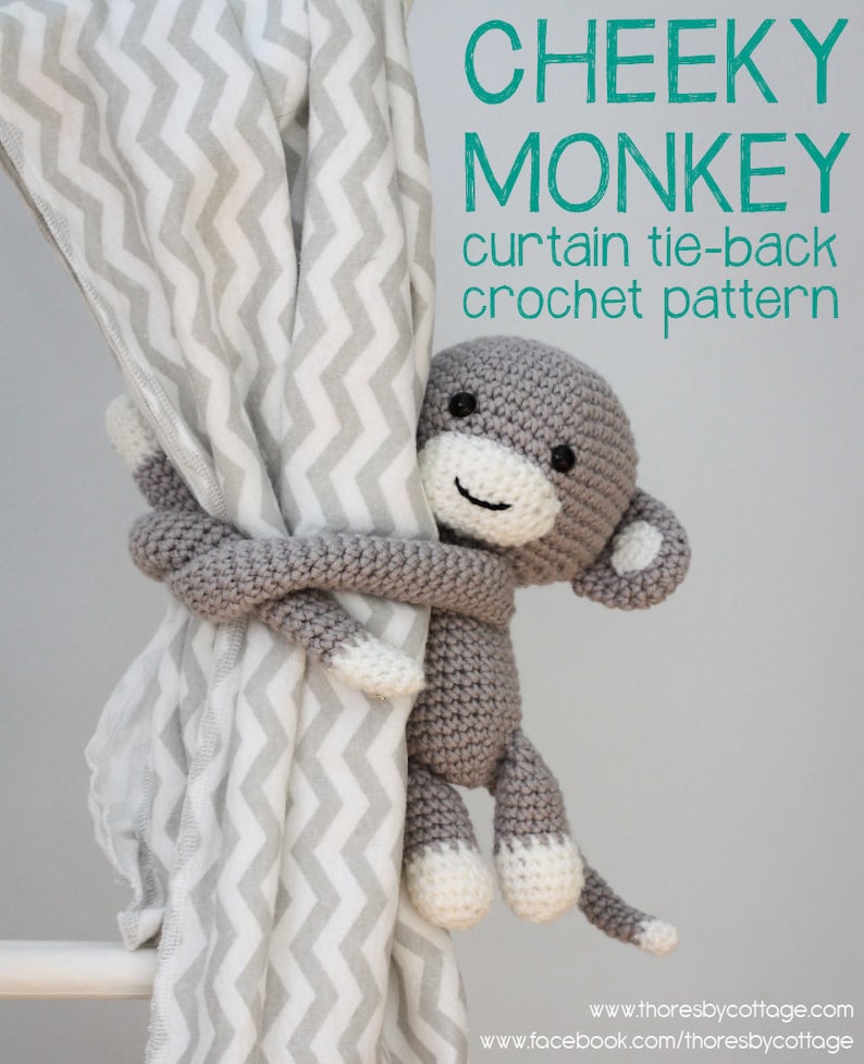 May include: A gray crocheted monkey holding a gray and white chevron patterned curtain tie-back. The monkey has a white face with black eyes and a black mouth. The text "CHEEKY MONKEY curtain tie-back crochet pattern" is above the monkey. The text "www.thoresbycottage.com www.facebook.com/thoresbycottage" is below the monkey.
