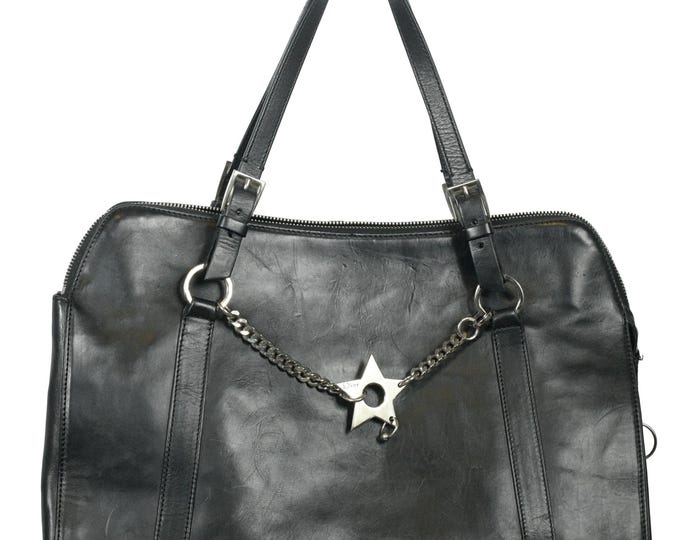 Christian Dior leather bag with piercing