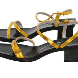 Charles Jourdan golden shoes