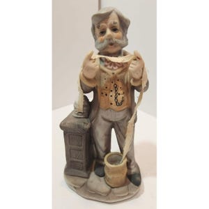 Vintage The Tycoon Figurine of Man Holding Stock Broking Tape