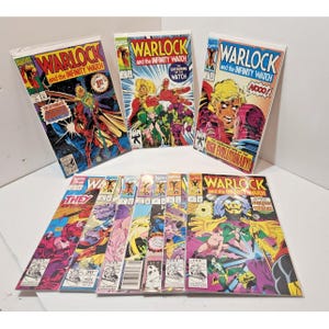 May include: A collection of Warlock and the Infinity Watch comic books by Marvel. Three issues stand upright in the back, while several others are laid out in a row in the foreground. The covers feature colorful illustrations and bold text.