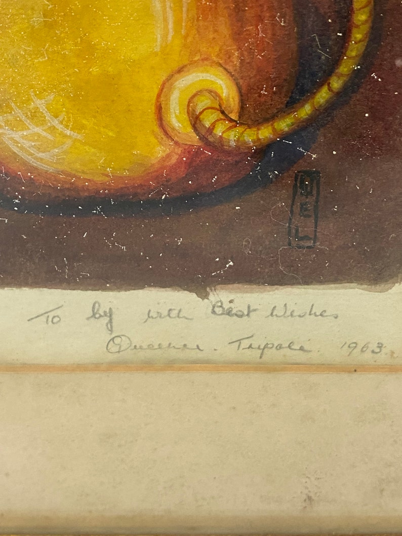 May include: A watercolor painting of a yellow cat with a curled tail. The painting is signed "To by with Best Wishes" and dated "1963".
