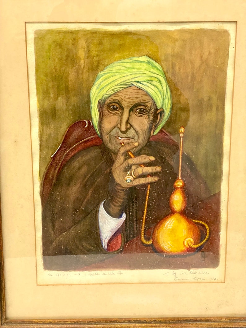 May include: A watercolor painting of an older man with a turban, wearing a brown robe, sitting and smoking a water pipe. The painting is titled "The Old Man with a Bubble Pipe" and signed "By John Platt-Mills,  Brussels,  Types, 1968."