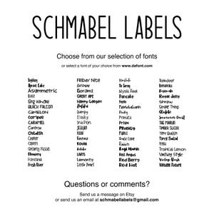 May include: A white background with black text listing a variety of fonts for custom labels. The text reads "Schmabel Labels" and "Choose from our selection of fonts or select a font of your choice from www.dafont.com". The fonts are listed in three columns.