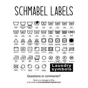 May include: A black and white chart of laundry care symbols with instructions for washing, drying, ironing, and dry cleaning. The chart includes temperature settings in degrees Celsius and Fahrenheit. The text at the bottom reads "Laundry symbols" and "Questions or comments? Send us a message on Etsy or by email at schmabellabels@gmail.com".