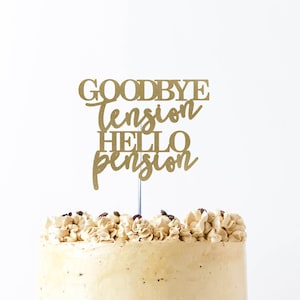 May include: A gold glitter cake topper with the text "Goodbye Tension Hello Pension". The topper is on a cake with brown frosting and coffee beans.