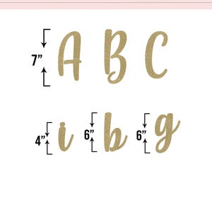 May include: A chart displaying letter sizes in gold glitter. The capital letters A, B, and C are 7 inches tall. The lowercase letters i, b, and g are 4 and 6 inches tall. The text "LETTER SIZE" is at the top.