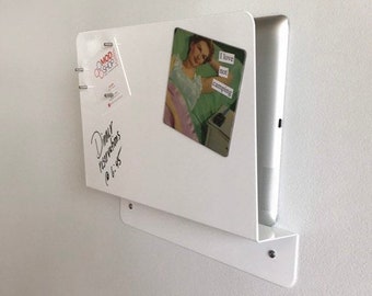 May include: A white wall-mounted metal organizer with a flat front panel for notes and a slot for a tablet. The panel features the text "Dinner reservations @ 6:45," a "MOD SHOP" logo, and a square magnet showing a person with the text "I love not camping."