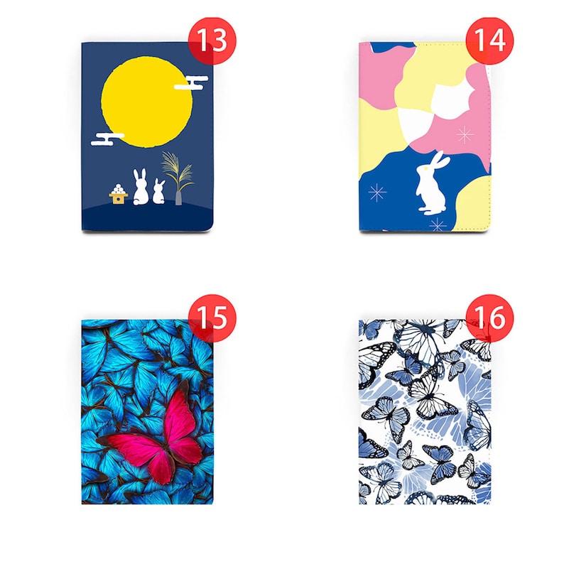 May include: Four different notebook covers with various designs. The first cover is blue with a yellow moon, white rabbits, and a small building. The second cover is pink, yellow, and white with a white rabbit. The third cover is blue with a pink butterfly on a background of blue butterflies. The fourth cover is white with blue butterflies.