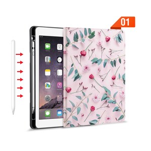 May include: A pink floral iPad case with a white background and green leaves. The case is shown with a white iPad and a white stylus.