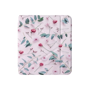 May include: A pink tablet case with a floral pattern featuring pink and red flowers and green leaves.