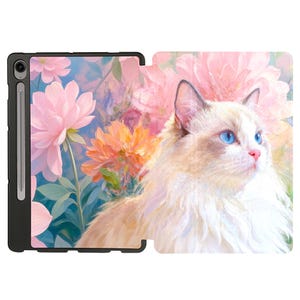 May include: A black tablet case with a floral design and a portrait of a Ragdoll cat with blue eyes. The case features a stylus and a cover that opens to reveal the cat and flower artwork.