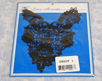 May include: Black lace applique with a floral design, packaged on a blue background with the text "Lace Accents by International Lace" and "GROUP I" with a barcode.