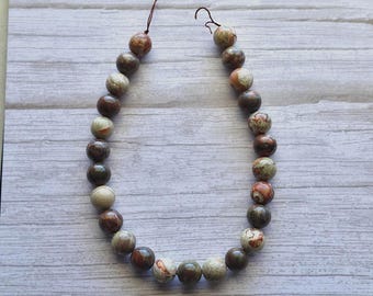 16 mm Fire Mountain Rhyolite Bead Strand