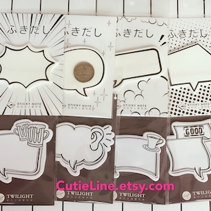 May include: A set of eight black and white sticky note pads with different speech bubble designs. The pads are packaged in clear plastic and have the text "ふきだし" (fuki dashi) which means "speech bubble" in Japanese. The pads also have the text "STICKY NOTE" and "TWILIGHT" printed on them.