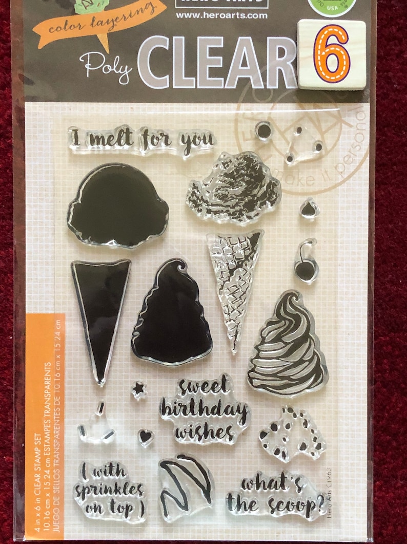 May include: A set of 6 clear polymer stamps featuring ice cream themed images and phrases like "I melt for you", "Sweet birthday wishes", and "What's the scoop?" The stamps are 4 inches by 6 inches (10.16 cm x 15.24 cm).