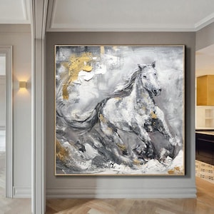 May include: Abstract painting of a white horse running through a grey and gold landscape. The horse is painted in a realistic style, with details of its mane and tail. The background is a mix of grey, white, and gold, with abstract shapes and textures.