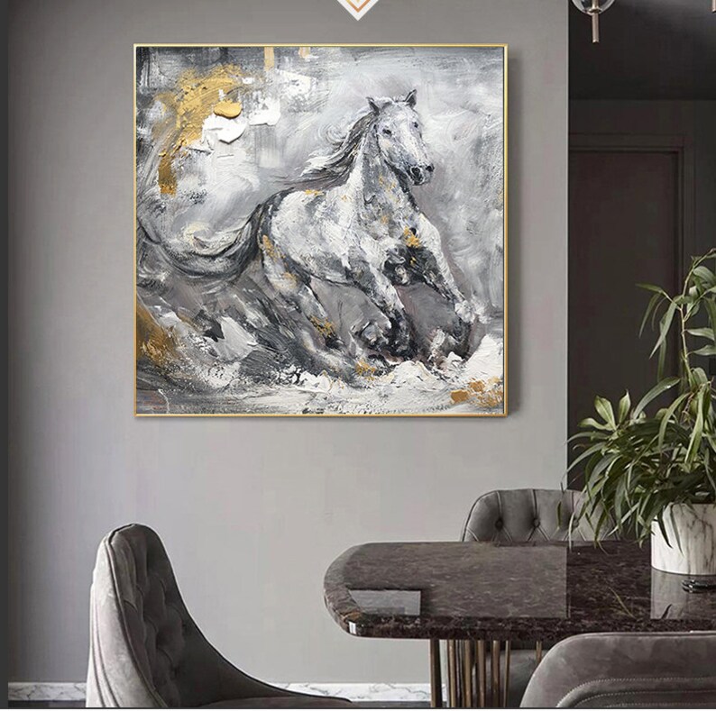 May include: Abstract painting of a white horse running through a grey and gold landscape. The horse is painted in a loose, expressive style with visible brushstrokes. The background is a mix of grey, white, and gold, with hints of black.