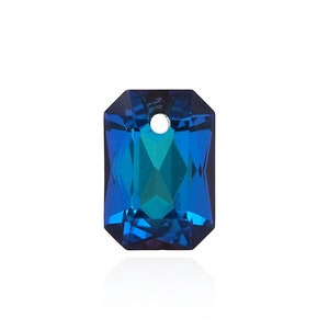 May include: A rectangular, faceted crystal pendant with a hole at the top. The crystal features a gradient of blue and teal hues, with a reflective surface. The gemstone is set against a white background.