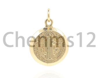 May include: A gold-colored Saint Christopher medal pendant. The medal features a detailed image of Saint Christopher carrying a child on his shoulders.