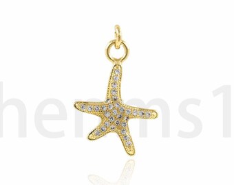 May include: Gold-toned starfish charm with clear sparkling stones. The charm is perfect for adding a touch of whimsy to jewellery.