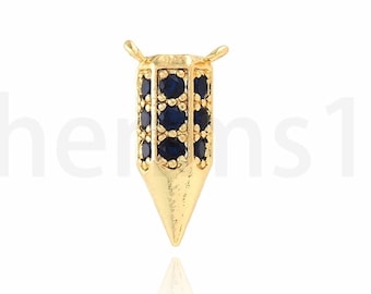 Può includere: Ciondolo in oro con punta appuntita e design di pietre preziose blu.