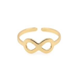 May include: A gold infinity symbol ring. The ring is simple and delicate, making it a great choice for everyday wear.