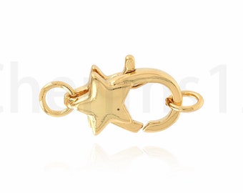 May include: Gold-toned star-shaped clasp for jewelry making. The clasp is made of metal and has a spring-loaded mechanism.