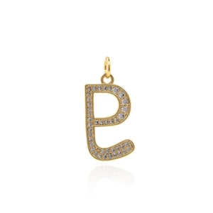 May include: Gold-tone charm pendant featuring the letter 'e' encrusted with clear cubic zirconia stones.