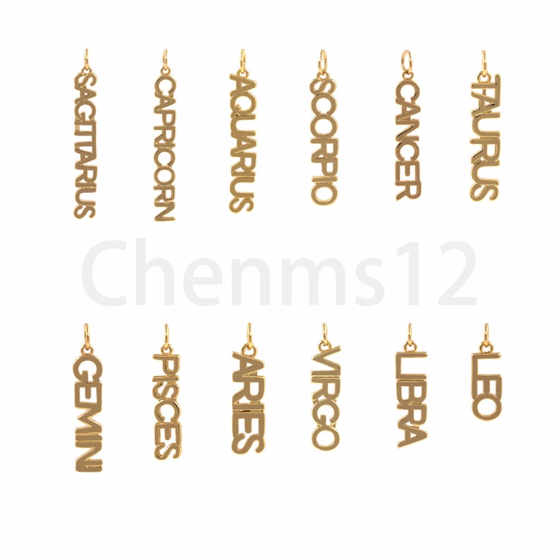 May include: Twelve gold-colored zodiac sign charms, each with a different astrological symbol. The charms are arranged in two rows of six, with the signs of Sagittarius, Capricorn, Aquarius, Scorpio, Cancer, and Taurus in the top row, and Gemini, Pisces, Aries, Virgo, Libra, and Leo in the bottom row.