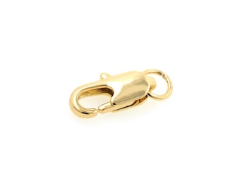 May include: Gold-toned metal lobster clasp with a ring for attaching to a chain or cord.