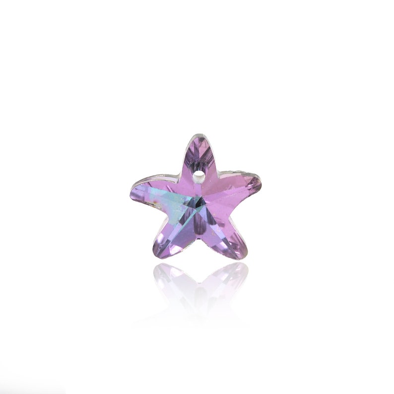 May include: A small, purple, crystal starfish charm with a hole for stringing.