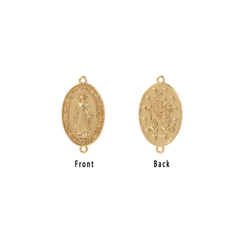 May include: Two gold-colored oval pendants. The front pendant features a detailed relief of a figure with text around the edge. The back pendant has a cross, the letter M, and two hearts. The word "Front" and "Back" are printed below each pendant.