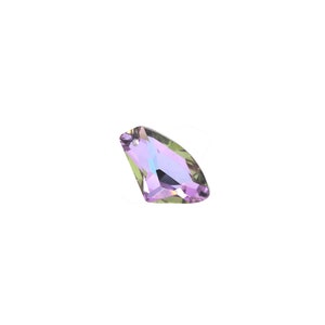May include: A faceted iridescent purple crystal with a green hue.