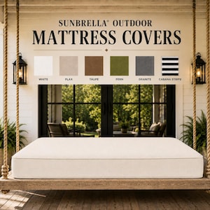 May include: A rectangular off-white mattress cover sits on a wooden hanging porch swing. Above, a sign reads SUNBRELLA OUTDOOR MATTRESS COVERS with color swatches labeled White, Flax, Taupe, Fern, Granite, and Cabana Stripe displayed in a row.