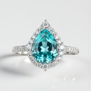 Paraiba Tourmaline Ring: Sterling Silver, High Carbon Diamond, Neon Blue Cocktail