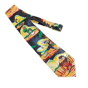 May include: A novelty necktie featuring cartoon characters on a black background. The tie has a repeating pattern of Bugs Bunny, Taz, and other Looney Tunes characters in a colorful design. The tie is made of a silky material.