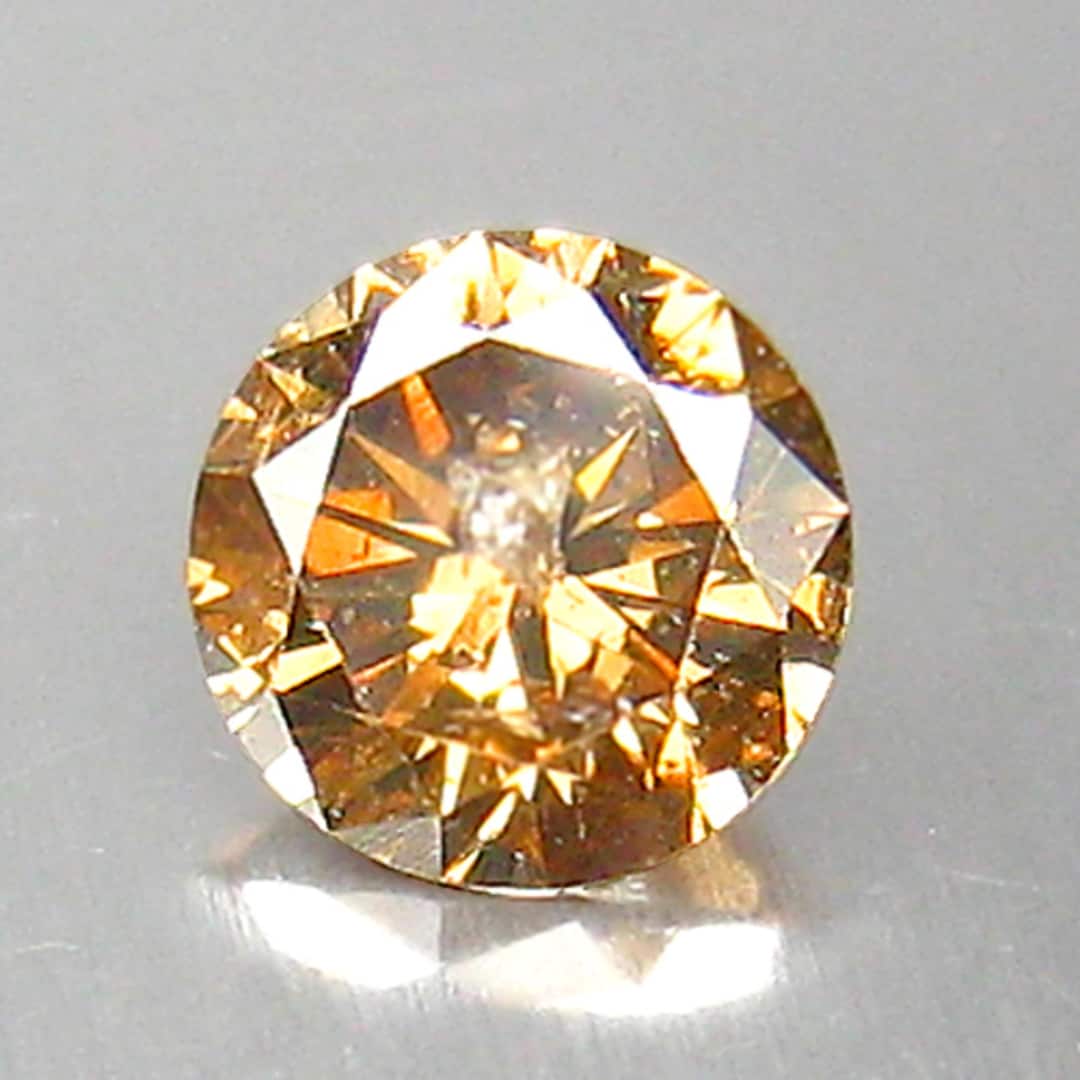 0.30ct gil Certified Untreated Natural Fancy Vivid Brownish Orange 