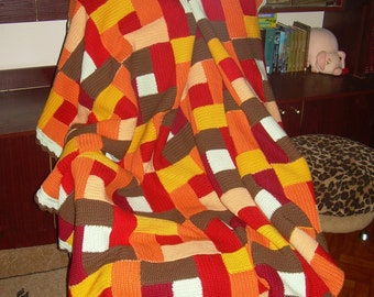 Knitted blanket handmade patchwork technique.