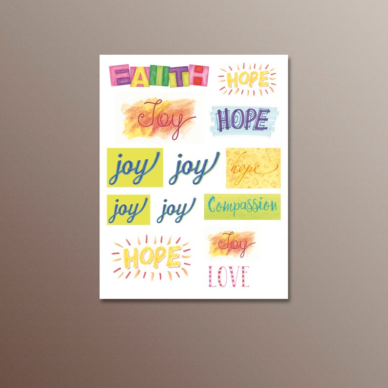 May include: A white background with colourful watercolour words, including "Faith", "Hope", "Joy", "Compassion", and "Love".