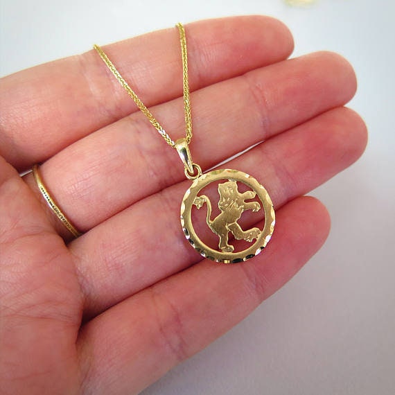 Solid gold leo pendant deals