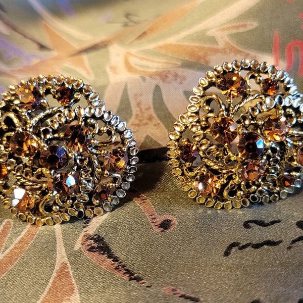 Boucles d'oreilles clip dorées vintage des années 1980 avec bronze scintillant et strass ambrés