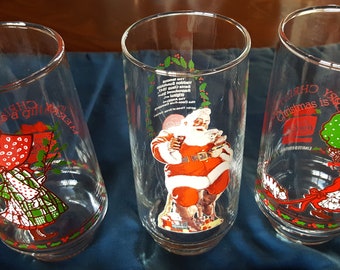 3 Coca-Cola Christmas Glasses - Haddon Sundblom Santa Clause, American Greetings Holly Hobbie Red and Green Bonnets - Vintage 1977