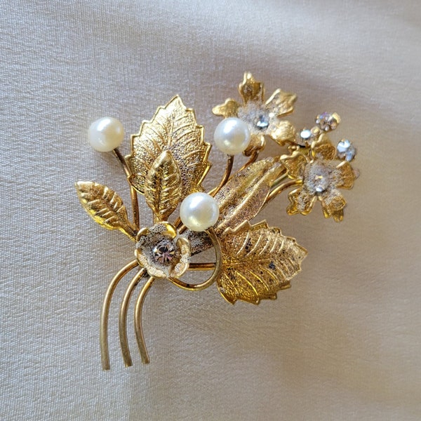 A Beautiful Golden Floral Brooch Of Flowers With Crystals And Faux Pearls In Very Good Vintage Condition - Clearly Marked "AUSTRIA"
