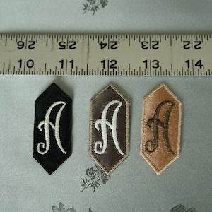 EMBROIDERED MONOGRAMMED INITIAL - A