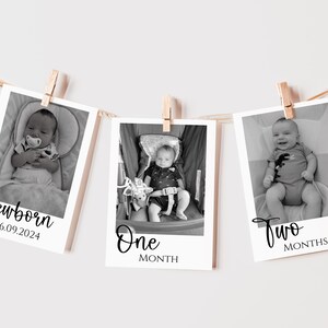 May include: Three black and white photographs of a baby at different ages, hung on a string with clothes pegs. The photos show the baby as a newborn, one month old, and two months old. The photos are labelled with the baby's age.