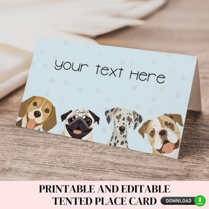 May include: Printable and editable tented place card with a light blue background and four dog illustrations. The text "your text here" is at the top of the card.