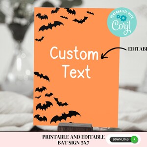 May include: Orange printable sign with black bats and the text "Custom Text" and "Editable!"  The sign is 5x7 inches and has a download button.